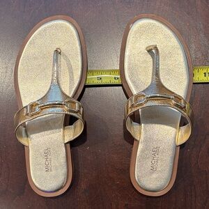 MICHAEL Michael Kors Metallic Gold Thong Sandals with Buckle Detail